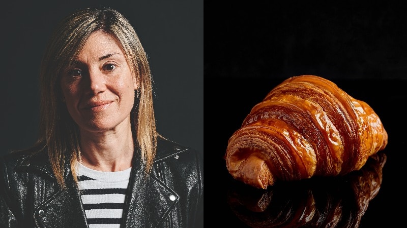 A portrait of a woman with blond hair is paired with a golden croissant central on a black background.