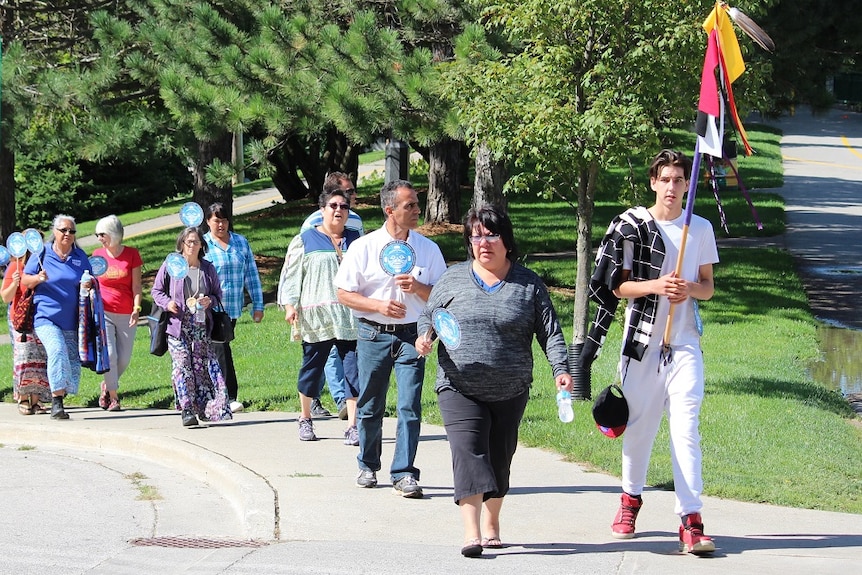 Denise General leads a march to commemorate missing and murdered Indigenous girls.