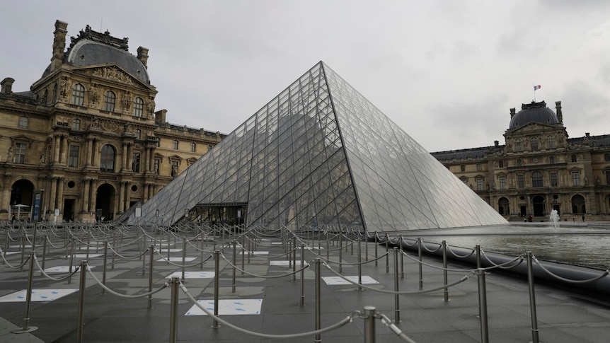 The empty courtyard of the Louvre museum is pictured.