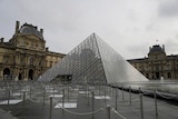 The empty courtyard of the Louvre museum is pictured.