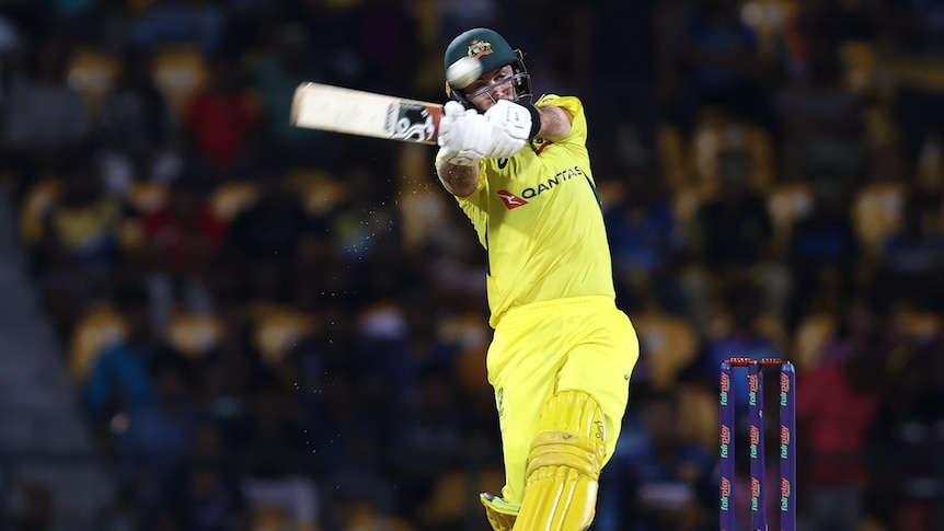Glenn Maxwell swings his bat across to hook a ball to the boundary for Australia in a limited overs match.