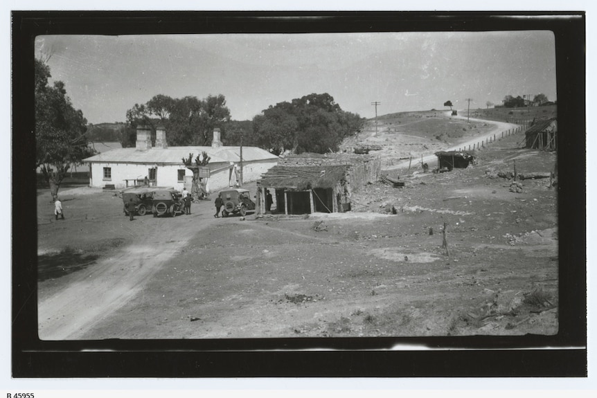 A picture of historic vehicles and buildings