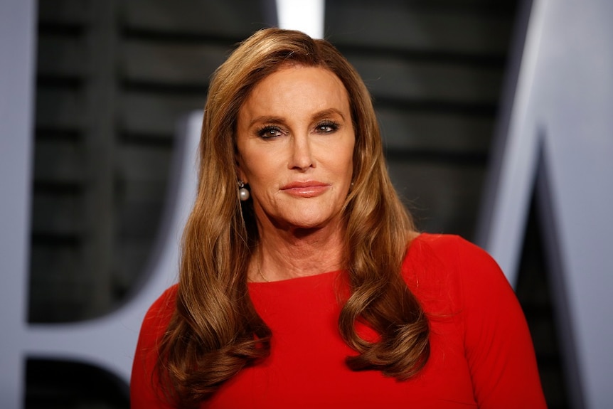 Caitlyn Jenner wearing a red jumper.