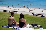 People at Cottesloe Beach on a hot day.