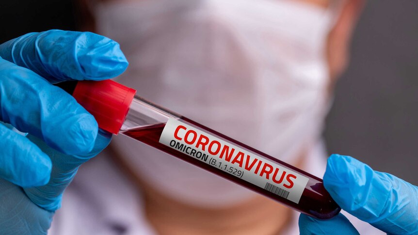 Close up of a test tube labelled coronavirus Omicron variant
