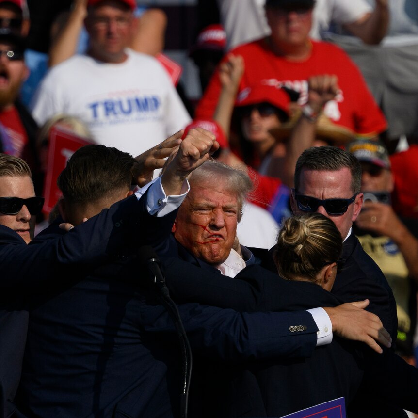 Trump defiant at rally