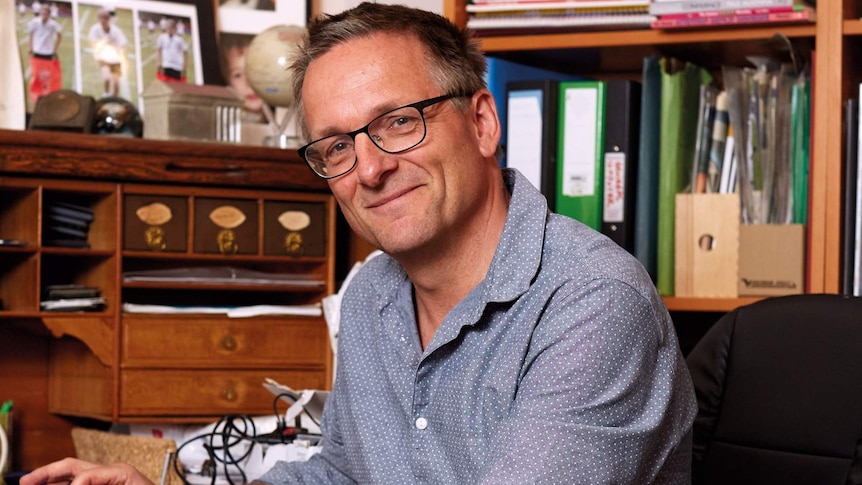 Dr Michael Mosley, pictured at home
