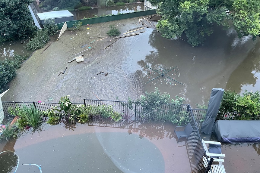 Flooding in a back yard.