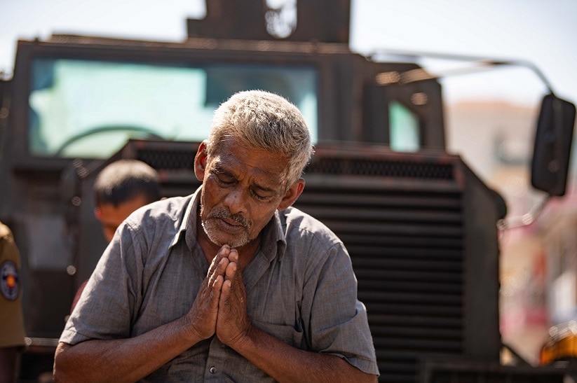 A man in Colombo prays for the victims of the Sri Lanka attacks.