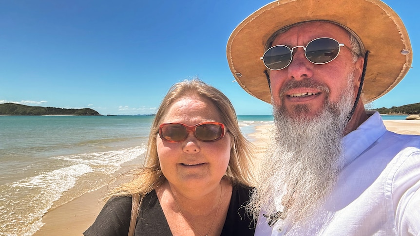 Kellie and Grant Ottaway on a beach