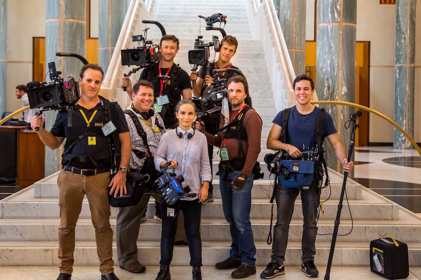 The production crew with the cameras they used to film The House.