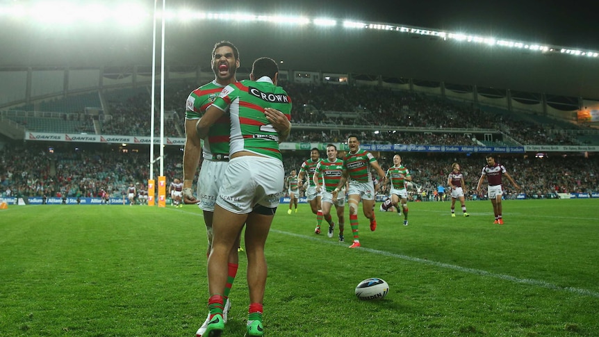Greg Inglis and Alex Johnston celebrate a Rabbitohs try in their qualifying final against Manly