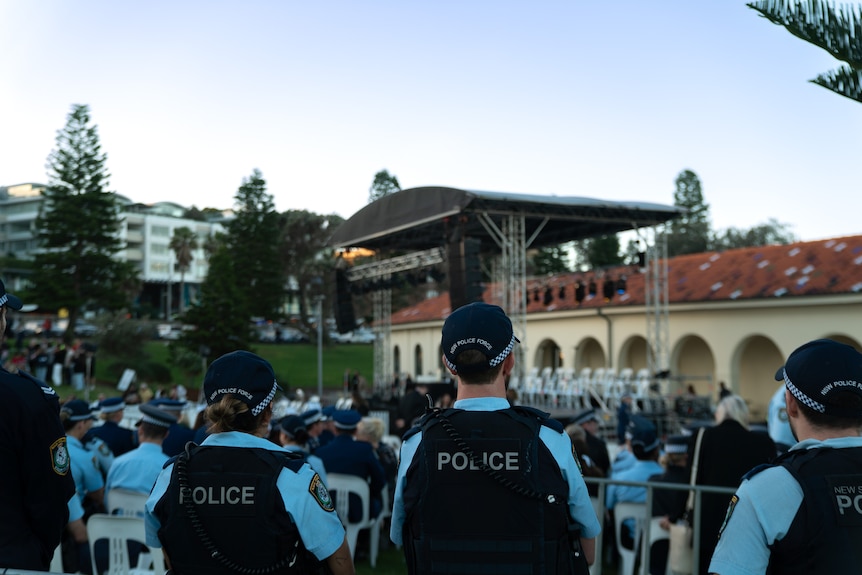 NSW Police officers attend the vigil at Bondi Beach on Sunday, April 21, 2024 