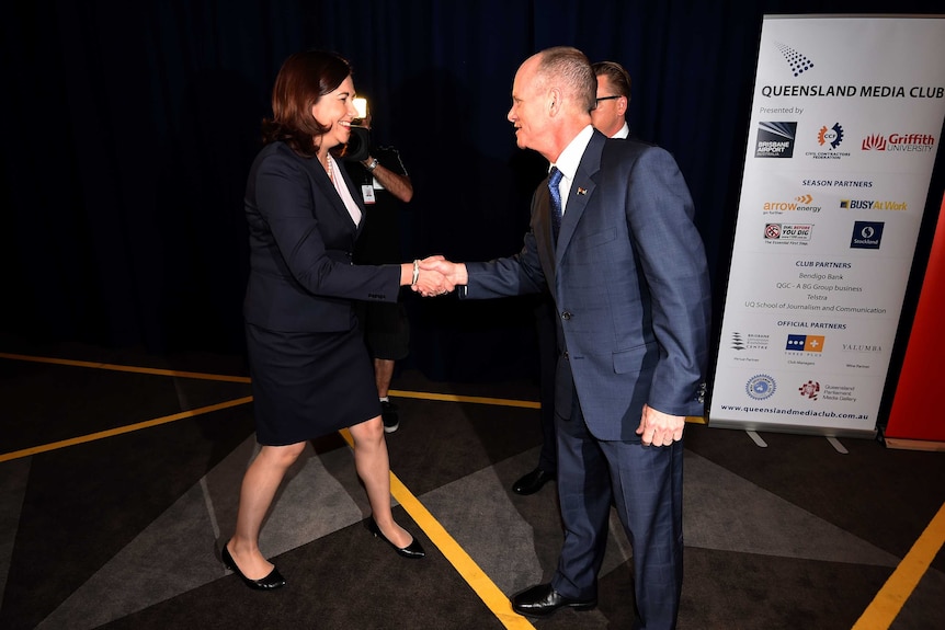Premier Campbell Newman greets Annastacia Palaszczuk for debate