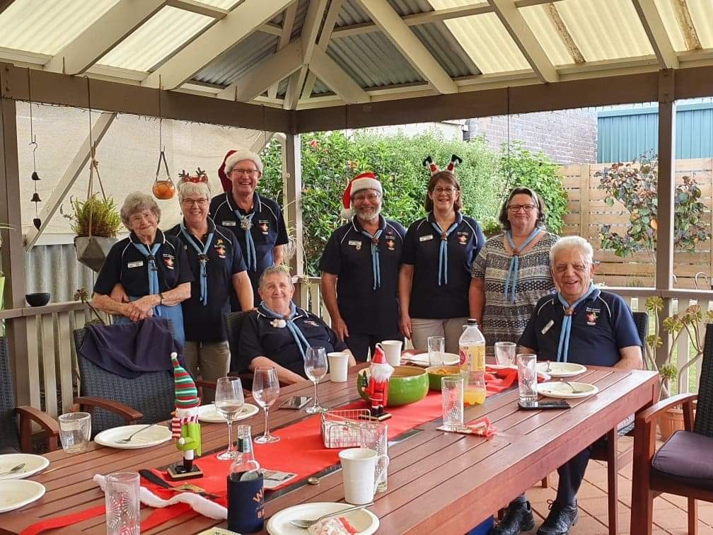 a woman standing with people