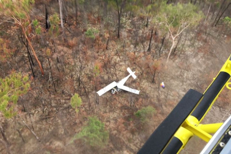 Wreckage of a crashed aircraft lies in bushland near Bundaberg in Queensland.