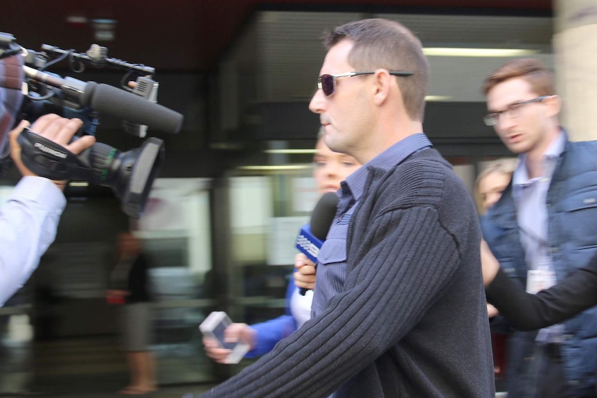 Jayde Paul Rowan leaves court surrounded by media