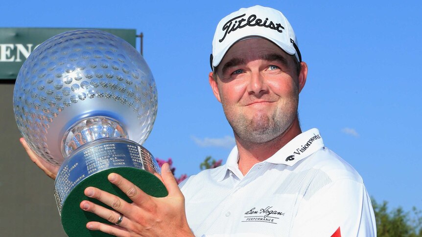 Marc Leishman lifts trophy at Sun City