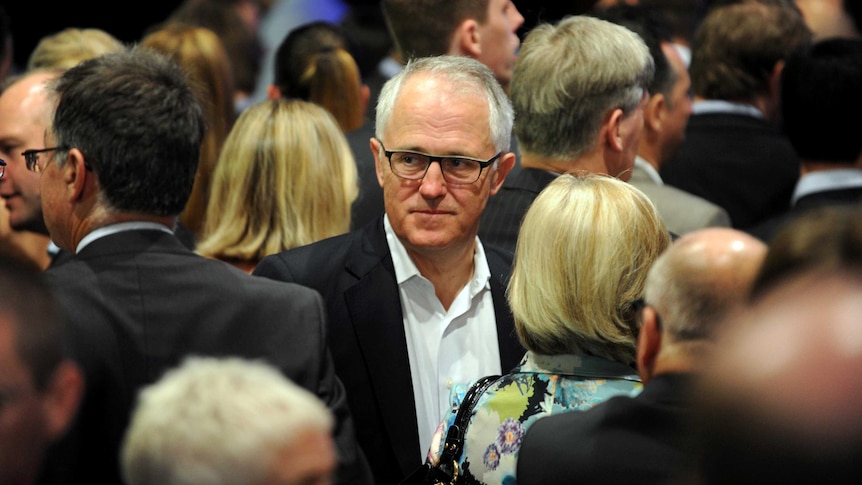 Malcolm Turnbull joins supporters as they wait for Prime Minister-elect Tony Abbott.