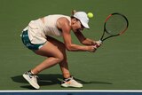Simona Halep returns a shot to Kaia Kanepi in the US Open first round on August 27, 2018.