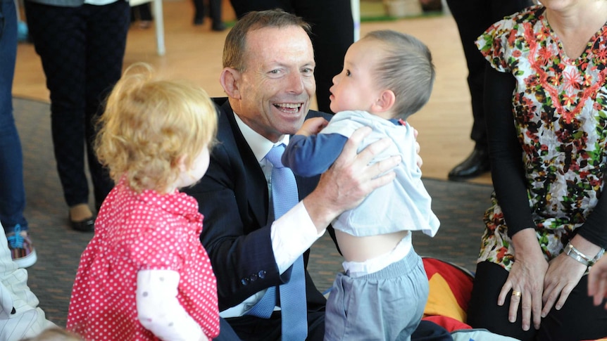Mr Abbott describes his paid parental leave scheme as his "signature policy".