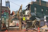 A wall of an old hotel in North Melbourne collapses