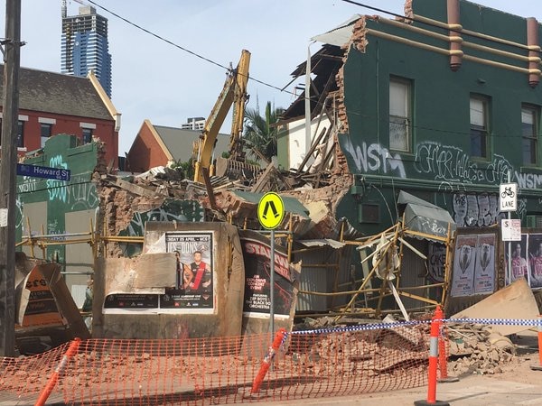 A wall of an old hotel in North Melbourne collapses