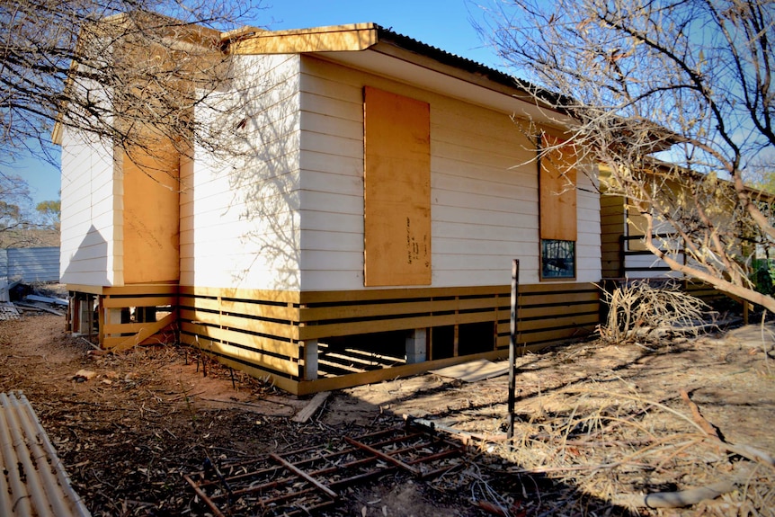 A boarded-up house in Leigh Creek