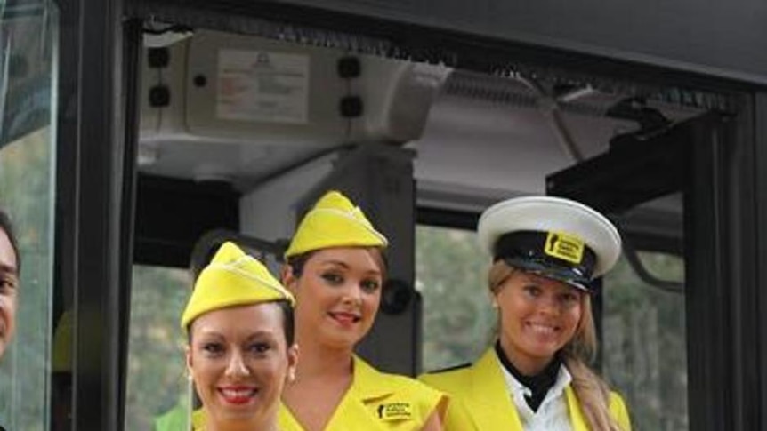 Drinking Safety stewards in their distinctive yellow uniforms
