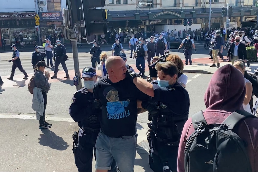 a man getting arrested by police