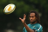 Tuqiri catches the ball at training