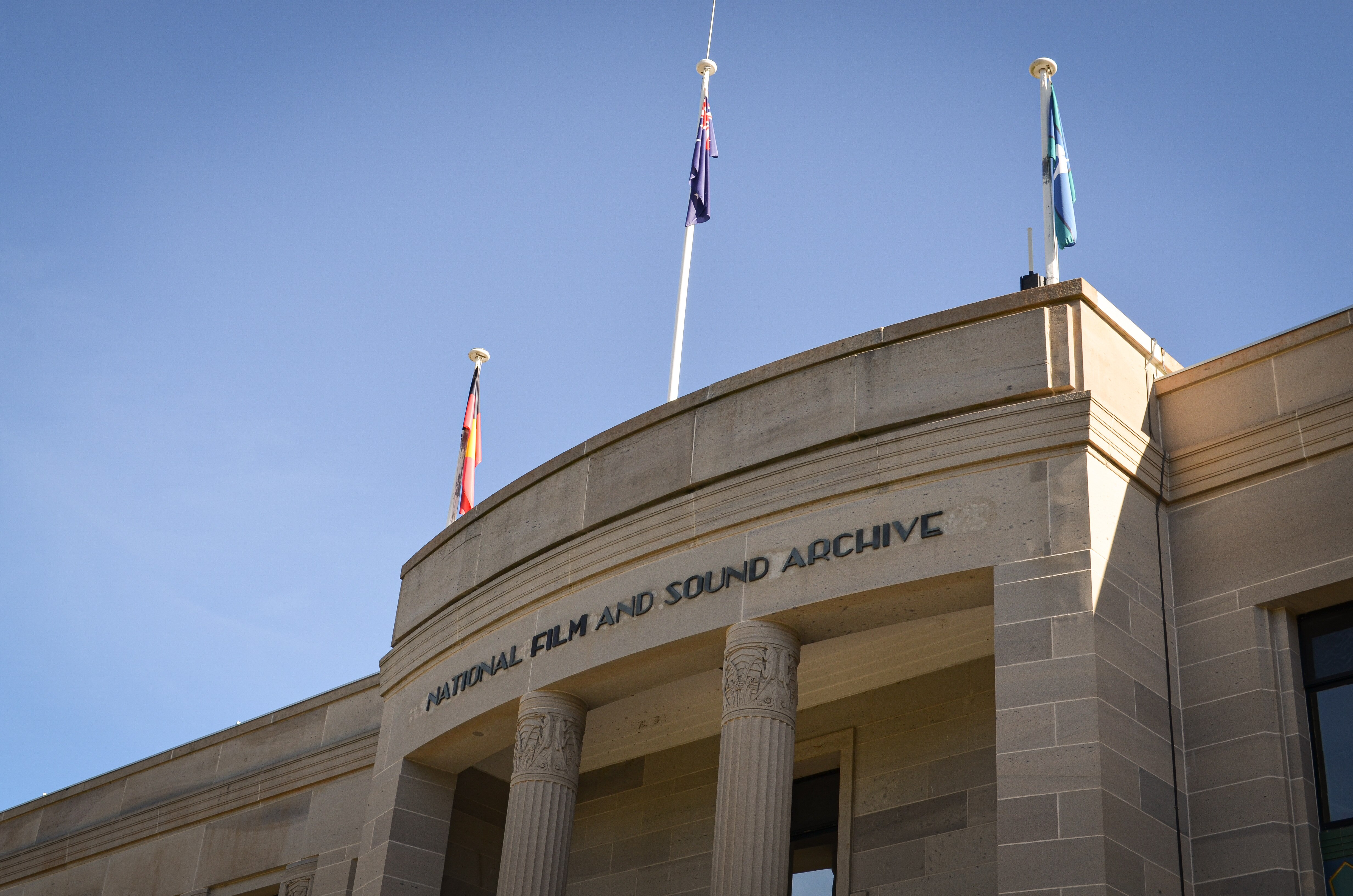 The front of the sandstone, art-deco style building with 'National Film and Sound Archive" at the top