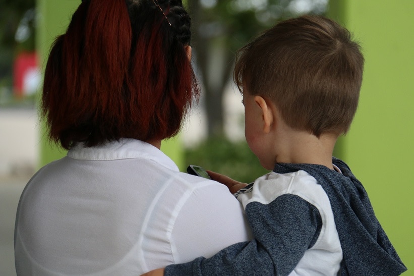 The young mother and her two-year-old son, identities obscured.