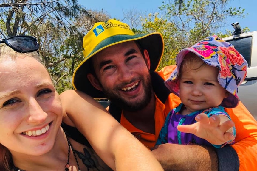 Happy family at the beach.