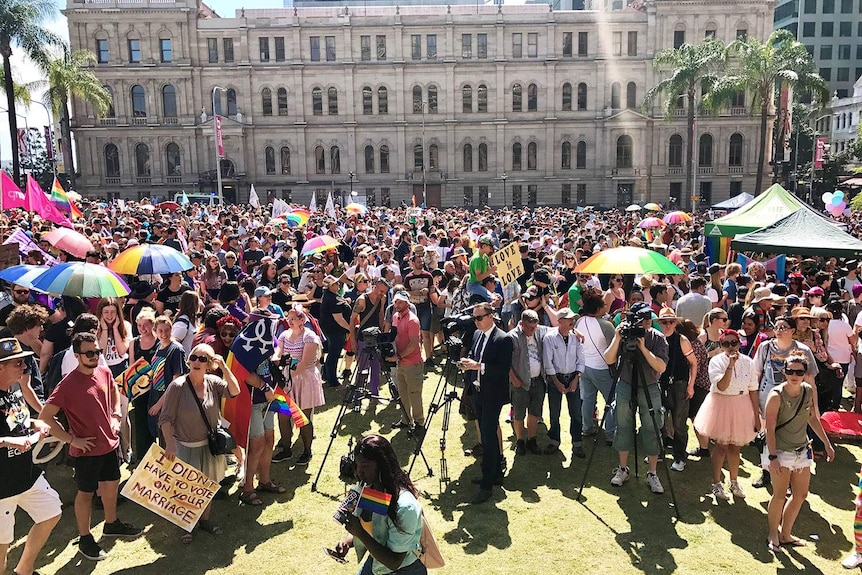Thousands of people rally in Brisbane's CBD at Queens Gardens for same-sex marriage.