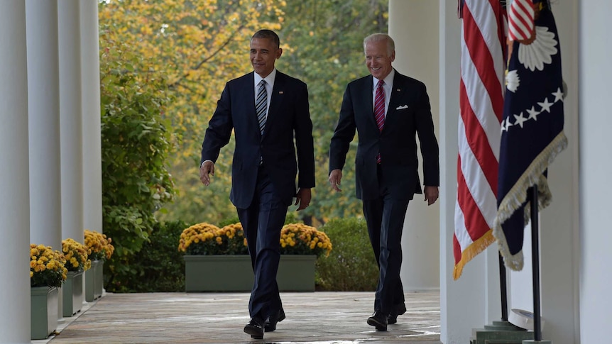 President Barack Obama and Vice President Joe Biden walk from the Oval Office to the Rose Garden at the White House in Washington, Wednesday, Nov 9, 2016.