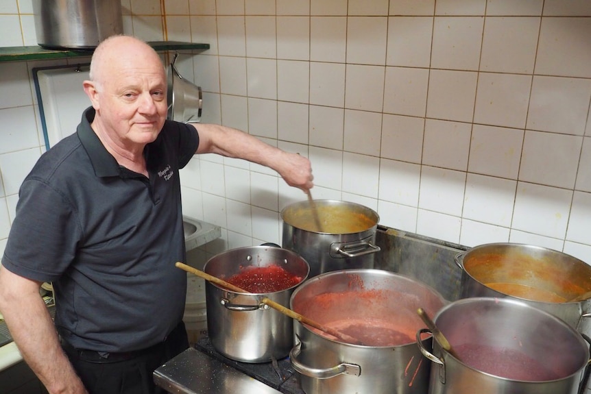 Russell Spokes cooks with multiple large pots on the boil