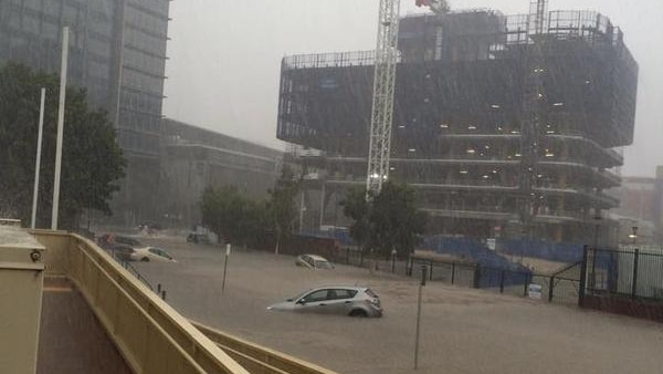 Floodwaters submerged cars at Bowen Hills in inner-Brisbane after a major storm hit.