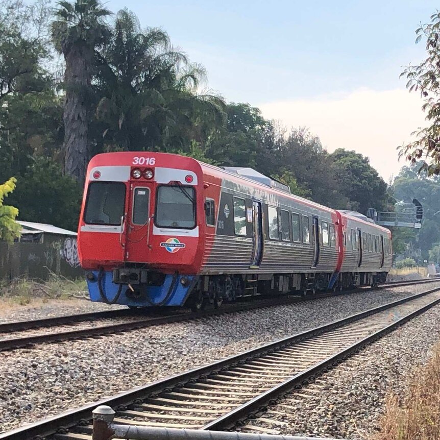 A diesel train on tracks