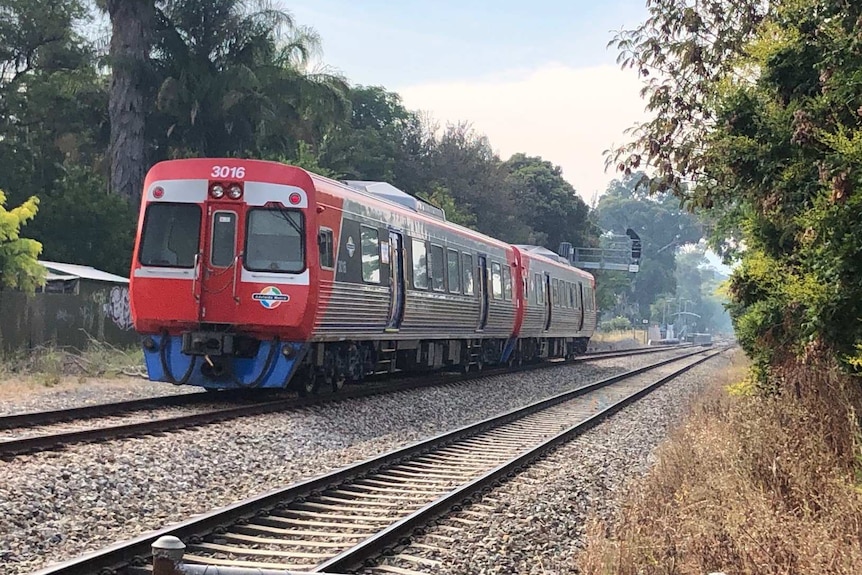 A diesel train on tracks