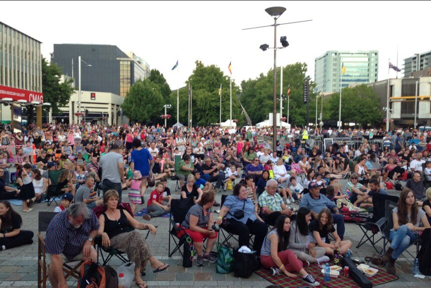 Hundreds of people in Civic Square in the city.