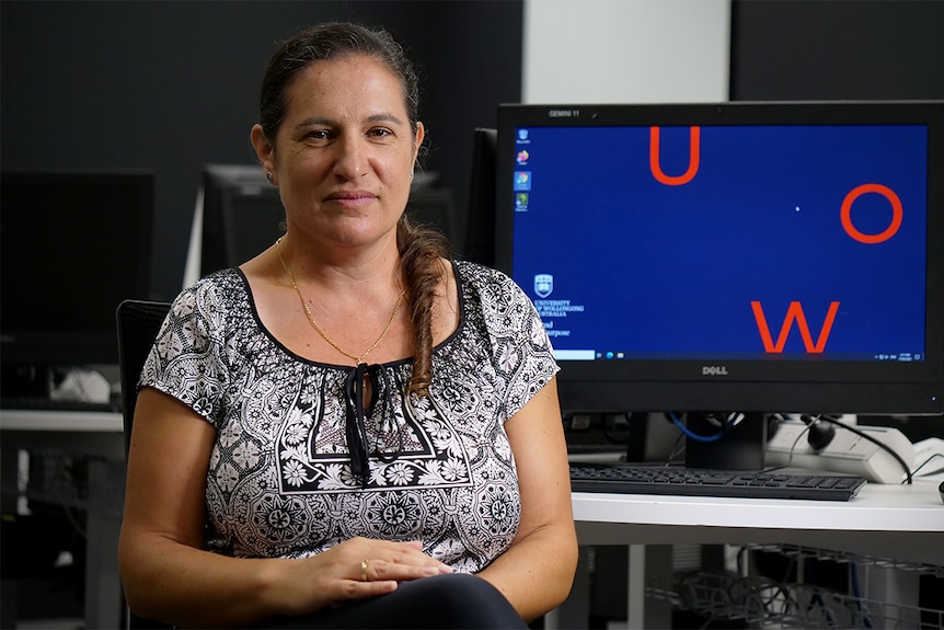 Privacy and Security researcher Dr Katina Michael sits in a University of Wollongong computer lab