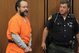 Ariel Castro (L), 53, enters the courtroom in Cleveland, Ohio July 26, 2013. Accused Cleveland kidnapper Castro agreed on Friday to plead guilty and serve life in prison without parole