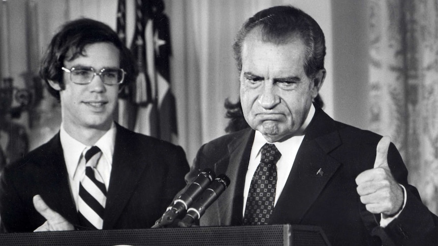 File photo dated 9 August 1974 of the 37th President of the United States, Richard Nixon, as he bids farewell to the White House staff.