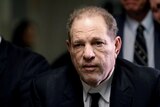 Harvey Weinstein in a suit and tie at court appearance. 