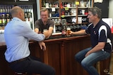 Ben Wigzell and Hayden Battle sit at a bar tasting lentil beer for the first time at Lobethal Bierhaus.