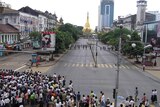 Clashes: Pro-democracy demonstrators take to the streets in Rangoon