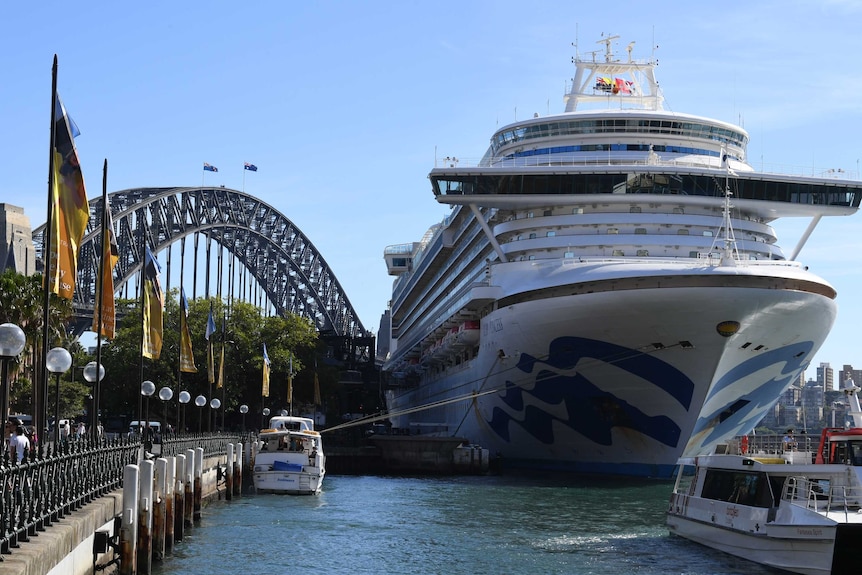 Cruise ship passengers disembark from the Princess Cruises owned Ruby Princess at Circular Quay in Sydney.