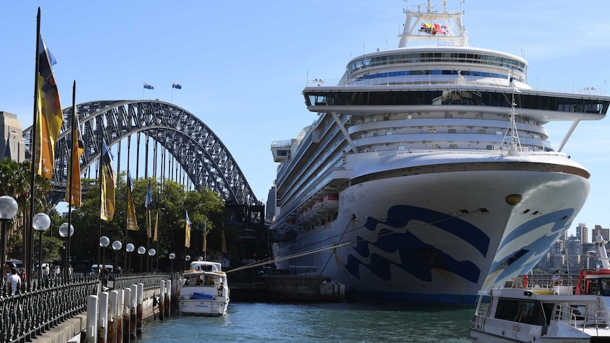 Cruise ship passengers disembark from the Princess Cruises owned Ruby Princess at Circular Quay in Sydney.