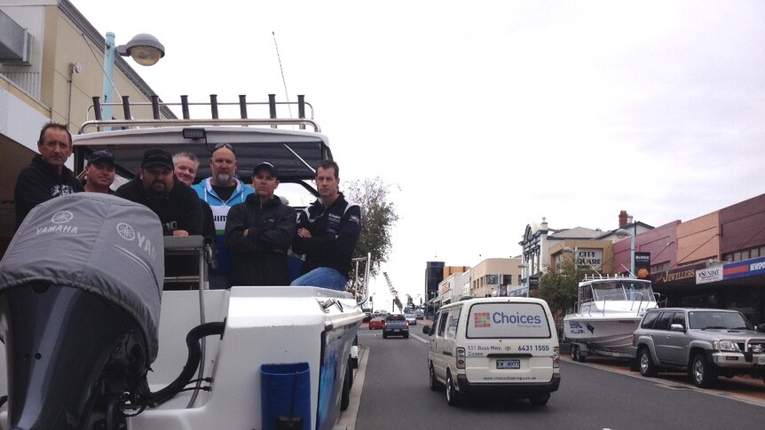 Tasmanian recreational fishermen standing on a fishing boat on a street in Burnie, north-west Tasmania